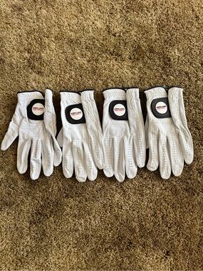 4 pack of white Kirkland Signature leather golf gloves; excellent condition